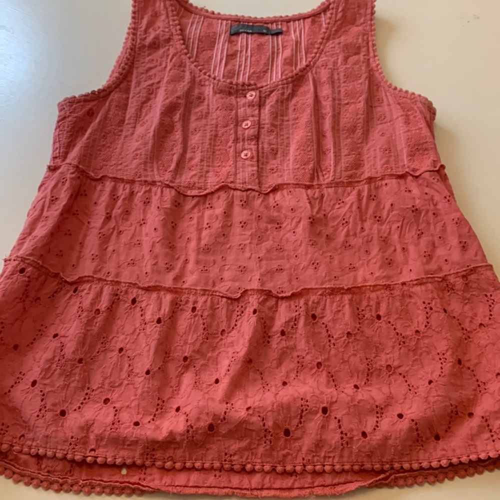 Prana sleeveless top with eyelet tears.